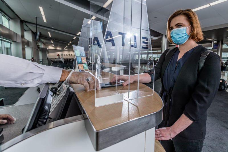 Delta Air Lines passenger with mask