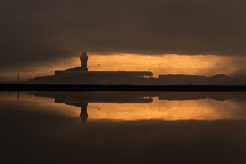 Portland International Airport control tower and terminal building at sunrise