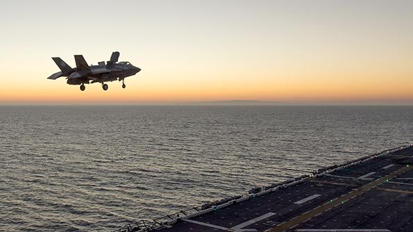 F-35 above aircraft carrier