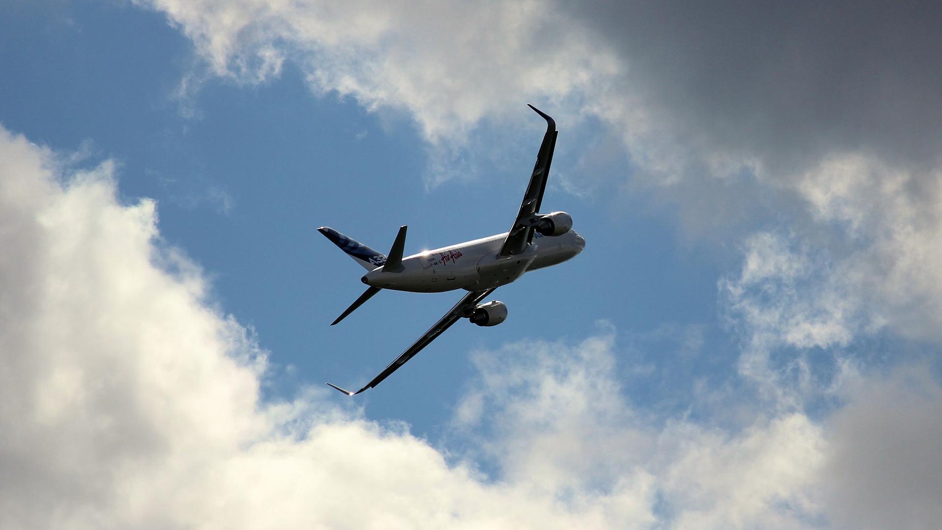 passenger aircraft in the clouds
