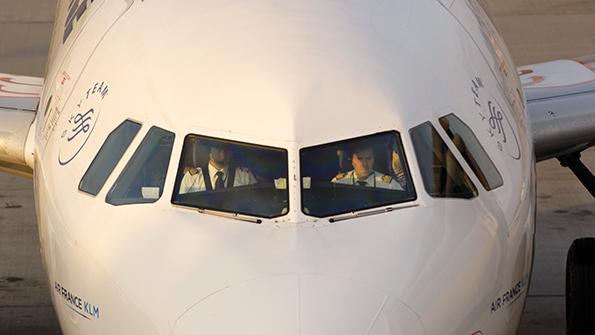 pilots in cockpit