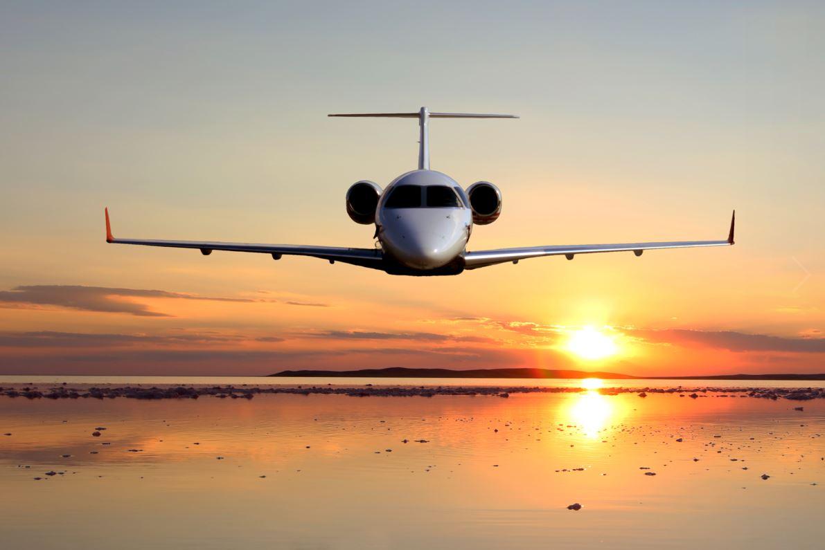private plane and sunset