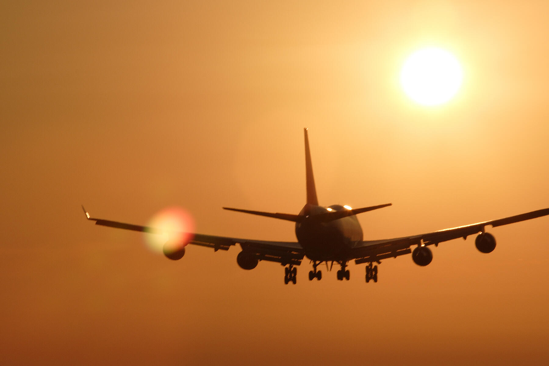 aircraft in sunset landing 