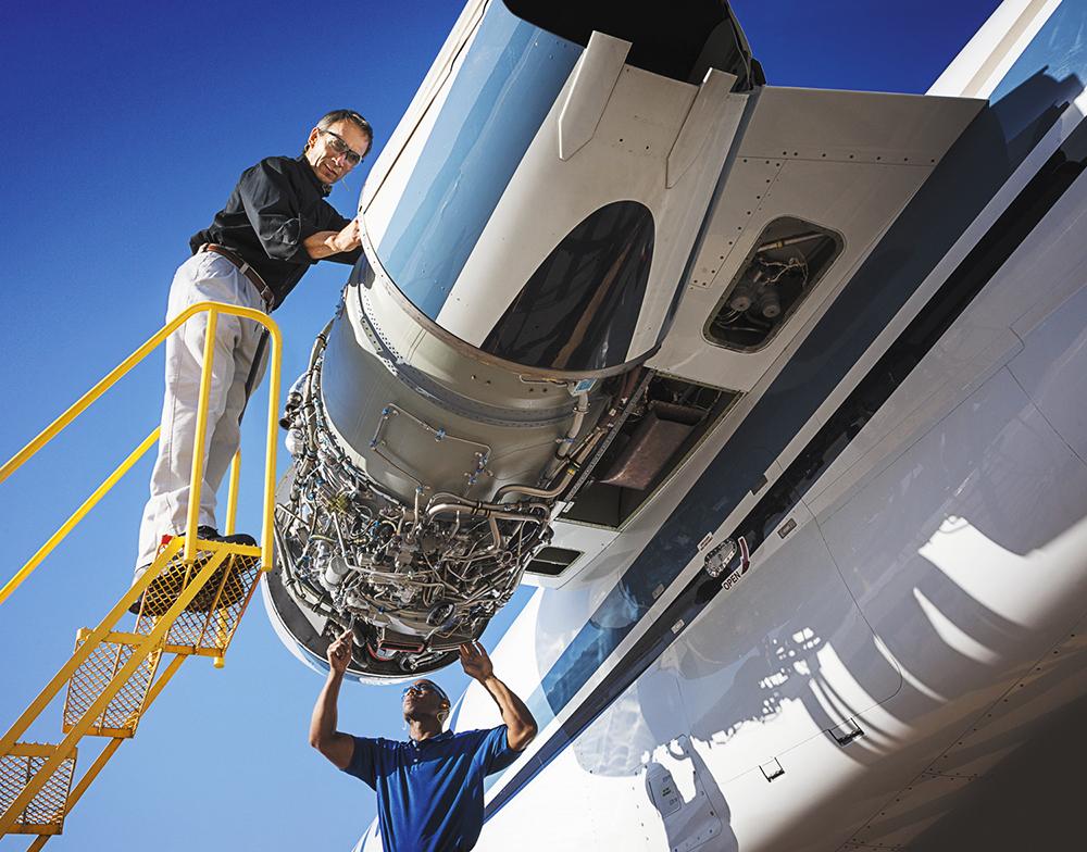 Technicians from StandardAero's Brazil team performing field services work.