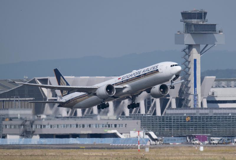 singapore airlines jet taking off