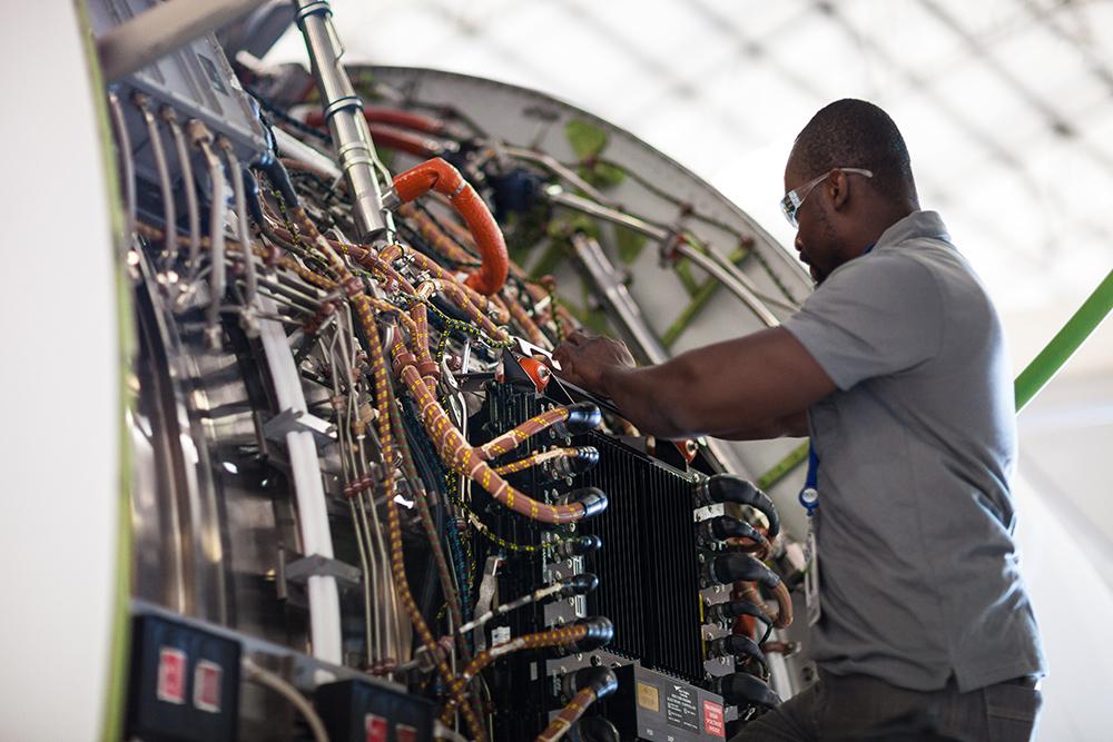 Mechanic working on engine