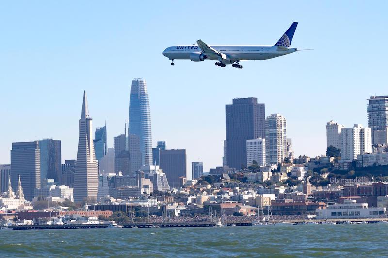 united airlines jet over San Francisco