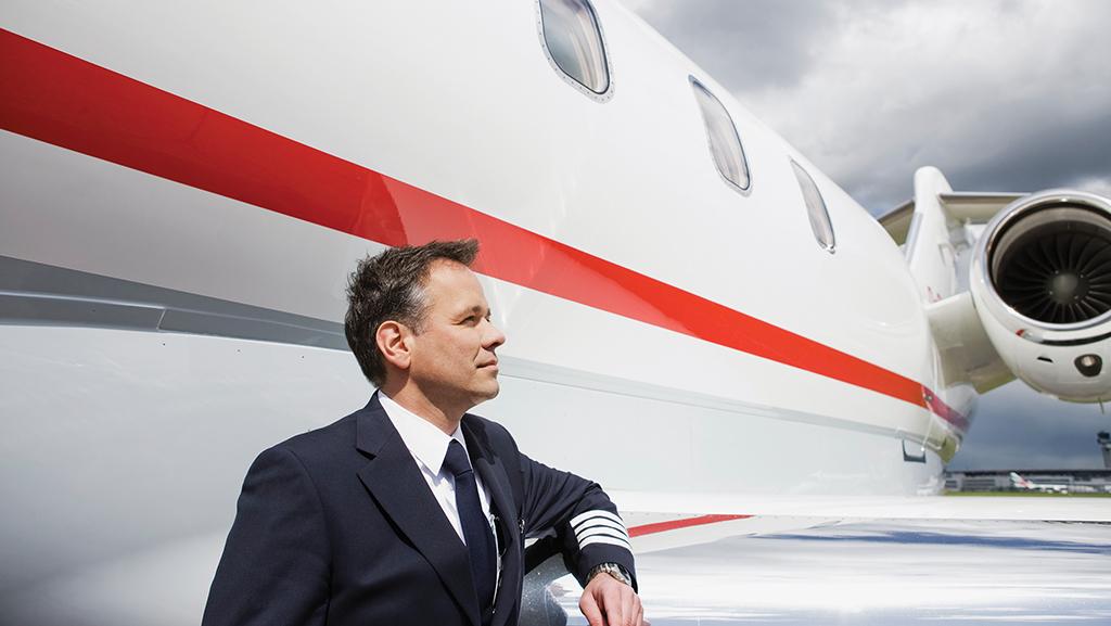 business pilot by aircraft
