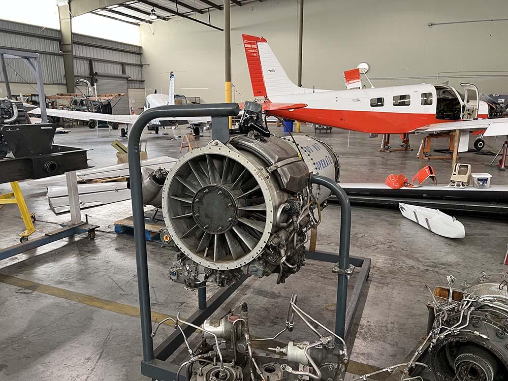 Aircraft and engine in hangar