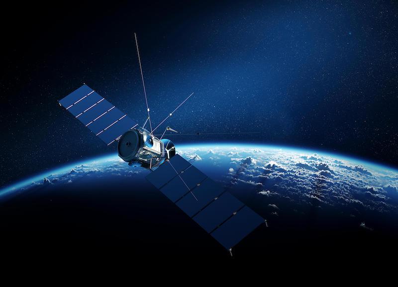 Comsat orbiting earth