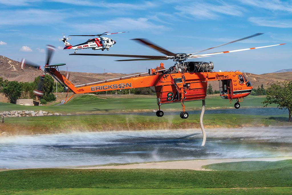 helicopters picking up water