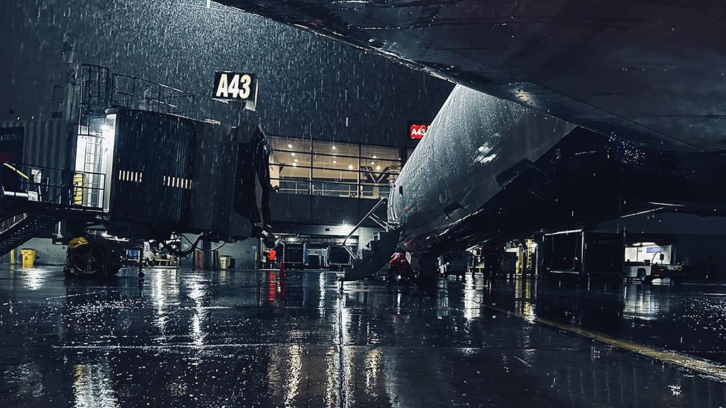 aircraft at terminal in thunderstorm
