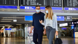 travelers with masks