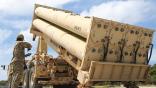 Soldier standing by THAAD system